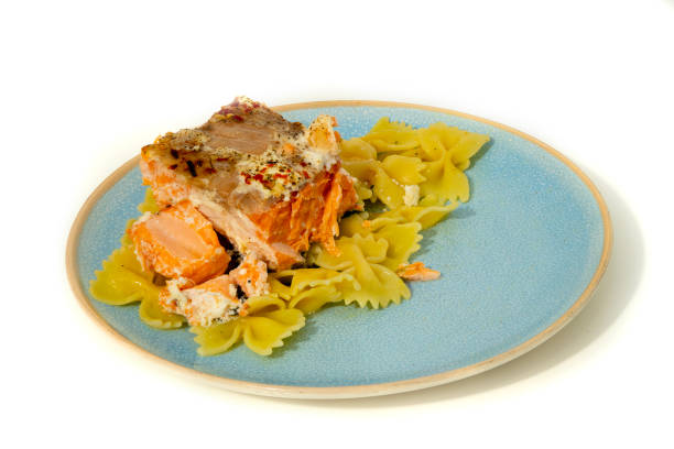 Pasta Penne rigate with salmon.