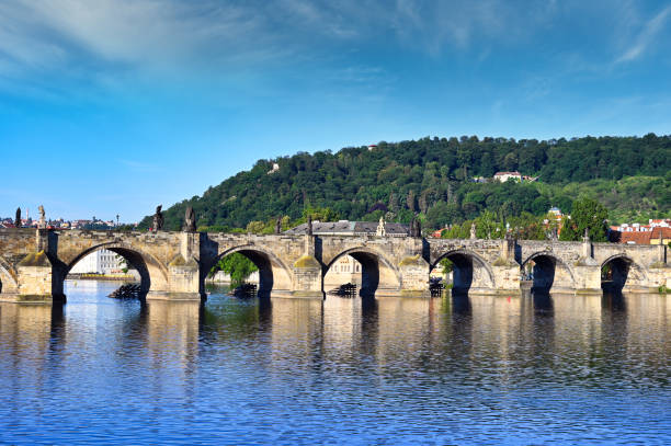 istock Old stone Charles bridge over Vltava river in Prague, Czech republic 2197247510