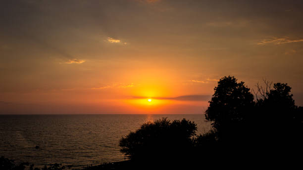 istock Summer sunset on the Black Sea. Waves in the sun light. 2197253404