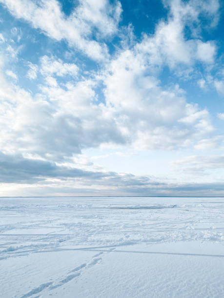 istock Huge frozen lake covered with thick snow. 2197261472
