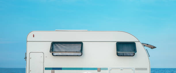 istock Camping trailer on Aegean sea beach in Greece 2197263821