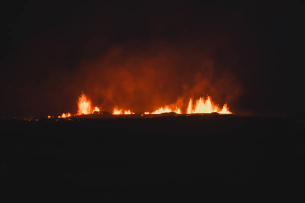 istock Fagradalsfjall area under volcanic activity. Grindavik Iceland. Bright volcanic eruptions light up the dark Icelandic night, with glowing lava fountains piercing the shadows 2197267239