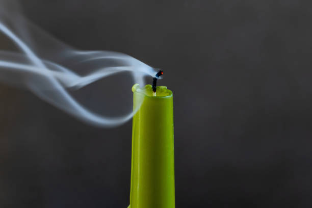 Candle blown out producing white fumes