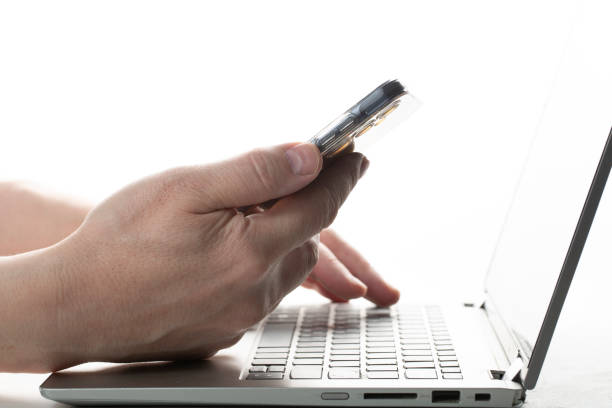 istock Hands of a man on a laptop. Close-up. A person is working at a computer. 2197274293