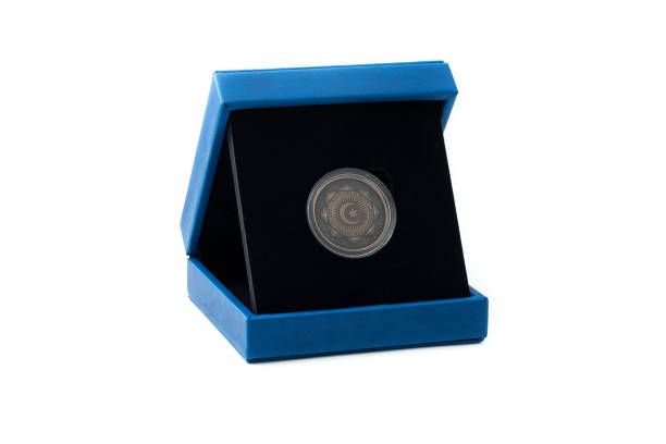 Bronze Commemorative Coin, Turkish States Organization isolated on white. This bronze coin was printed by the mint of the Republic of Turkey. (Turkish: Turk Devletleri Teskilati).