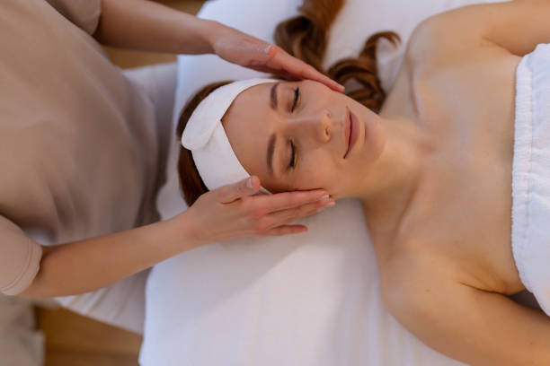 istock Luxurious Facial Massage in a Tranquil Spa 2197278781