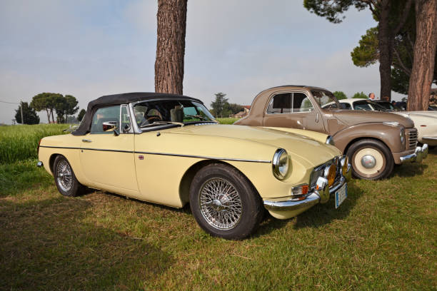 Vintage MG B Roadster Mk2 (1971) in classic car rally 15th Auto Moto Raduno, on April 25, 2015 in Piangipane, RA, Italy