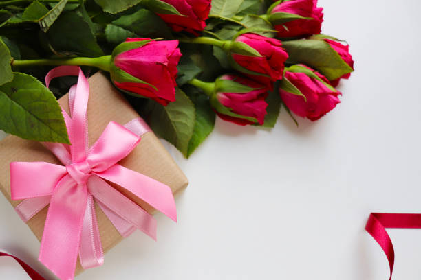 Valentine's Day greeting card mockup. Bouquet of flowers, red heart macaroons