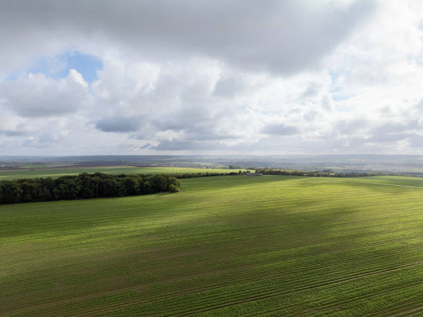istock harvested fields in different colors, with clouds in autumn, drone shot 2197282324