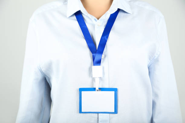 istock Businesswoman with blue blank badge 2197283048