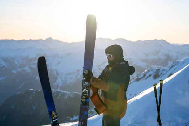 istock Backcountry skier prepares to descend mountain 2197283835