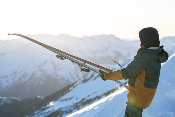 istock Backcountry skier prepares to descend mountain 2197283897