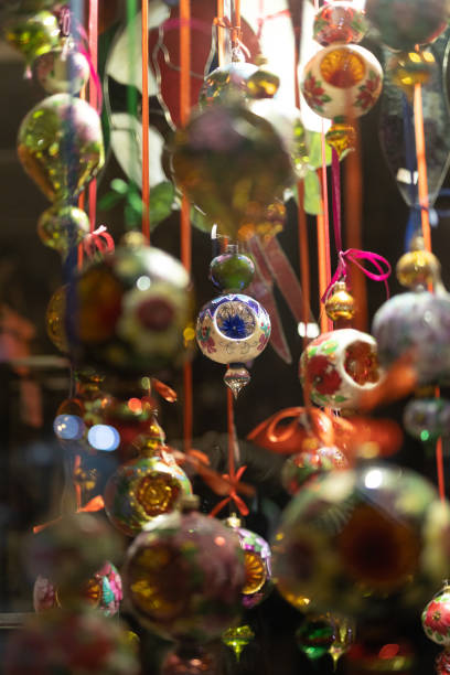 istock Christmas decorations in shop window at night 2197289546