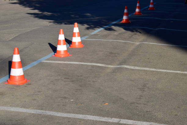 istock The sunlight on parking cone on the monochrome background. 2197290182