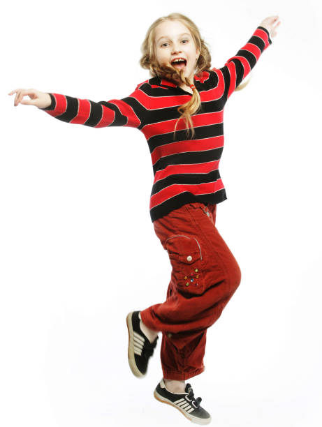 istock girl jumps on a white background 2197291765