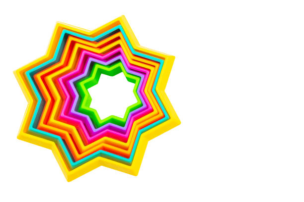 Rainbow star shaped sensory toy isolated on white background.