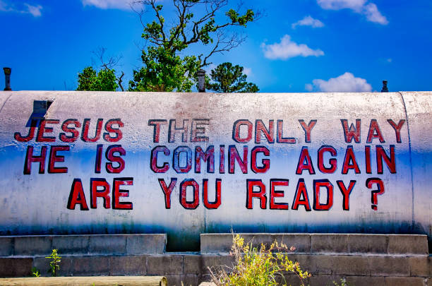 A religious sign is painted on a tank, May 27, 2021, in Bon Secour, Alabama. Bon Secour is an unincorporated fishing community of 743 residents in Baldwin County, Alabama.