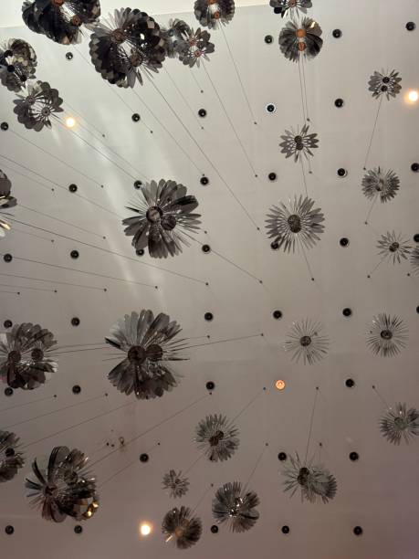 A beautifully crafted glass ceiling with intricate patterns, giving an artistic touch to the interior.