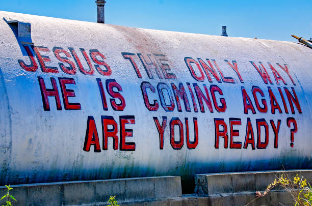A religious sign is painted on a tank, May 27, 2021, in Bon Secour, Alabama. Bon Secour is an unincorporated fishing community of 743 residents in Baldwin County, Alabama.