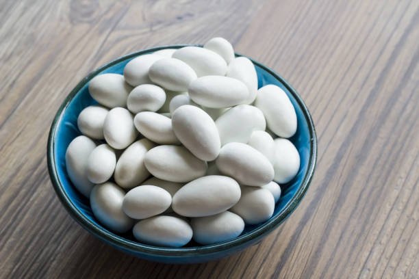 istock Almond Candies Blue Bowl 2197293071