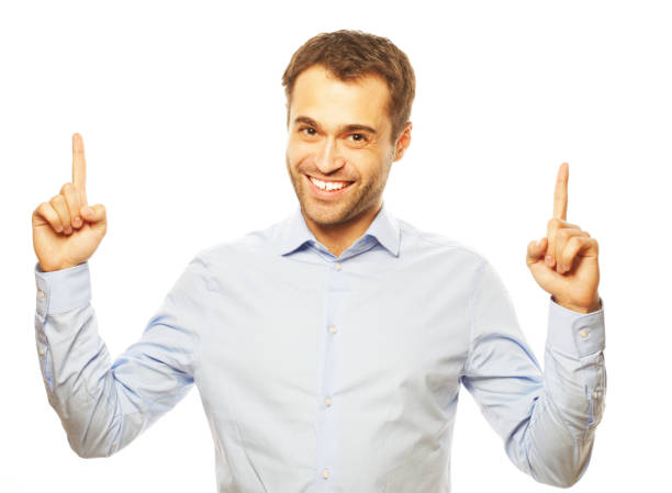 istock business man pointing up finger 2197298668