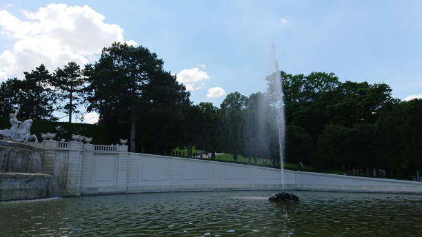 Aerial view of Gloriette Schonbrunn, Gloriette pavilion and Neptune Fountain in Schonbrunn park, Gloriette pavilion in Schonbrunn parkA gloriette (from the 12th-century French gloire meaning \