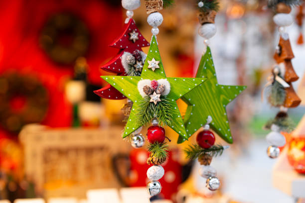 istock Green and Red Star Ornaments with Pinecones and Bells 2197303381