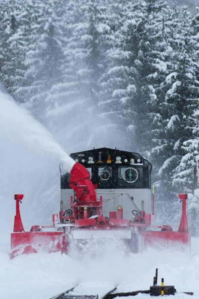 Nikii-cho, Hokkaido, Japan - February 2, 2025 : Snow removal train to fly snow runs on the Hakodate line