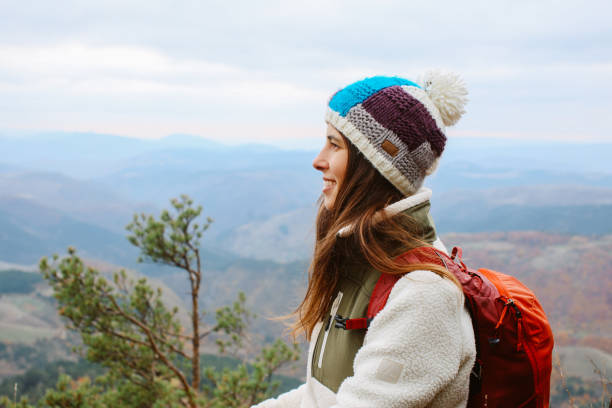istock young female hiker on top of the mountain range 2197304048