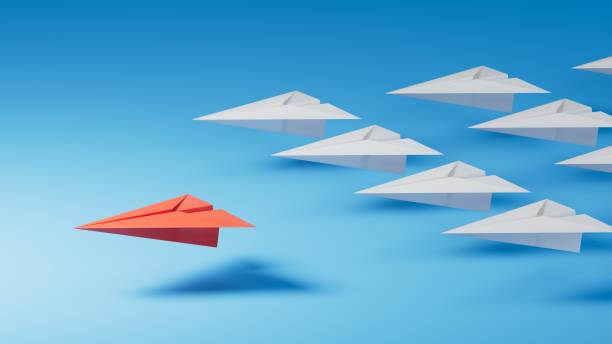 istock Different business concept.new ideas. paper art style. creative idea.Leaderplane concept, blue leader plane leading white planes.3D rendering on blue background. 2197308809