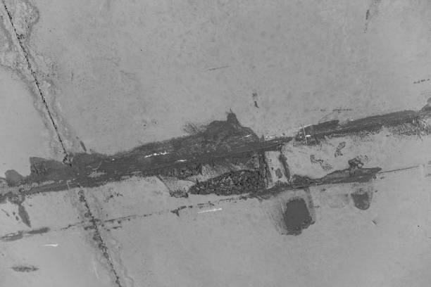 istock Crack in pavement exposed during maintenance work in urban area 2197308897