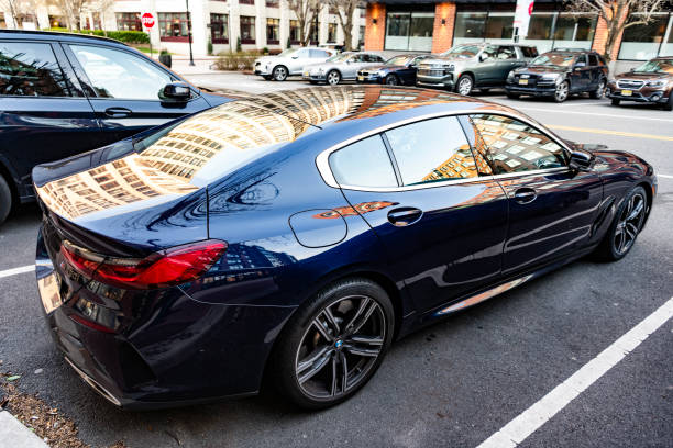 New York City, USA - March 15, 2024: BMW 8 modern car parked outdoor, back side view.
