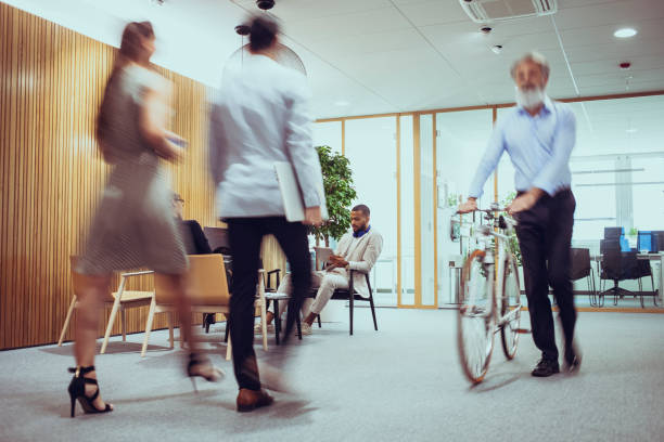 istock Diverse Executives in Office Lobby with Motion Blur 2197310983