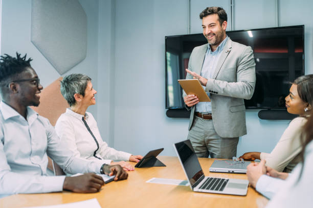 istock Team of professionals during a meeting. 2197317004