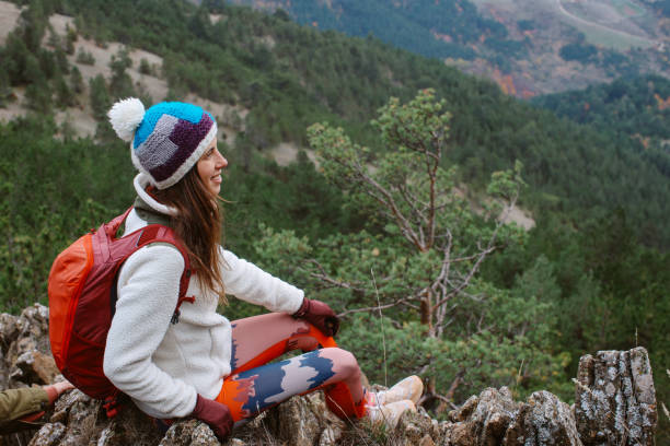 istock young female hiker on top of the mountain range 2197318421