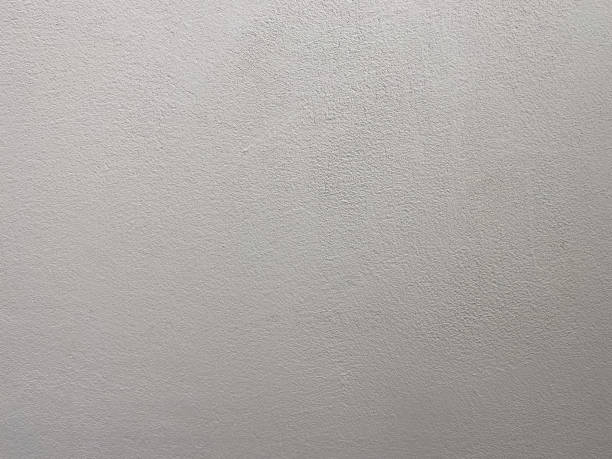 A close-up shot Textured Wall captures the fine, textured surface of a painted wall