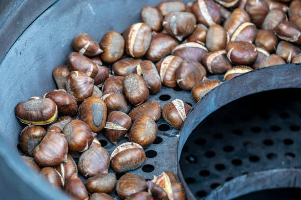 istock Chestnuts being roasted at Christmas. 2197322098
