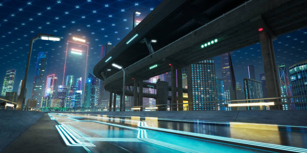 istock Futuristic highway traffic moving through illuminated metropolis at night 2197329899