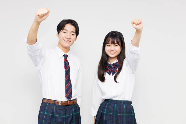 制服を着たアジアのティーンエイジャー - 応援 ストックフォトと画像