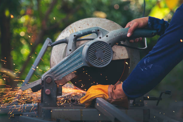 istock Welding machinery iron metal sparking fire flame close up construction Worker hands. Men hands protect glove Hot flame metal work cutting fire iron workshop. Locksmith Welding machine metal industry 2197333175