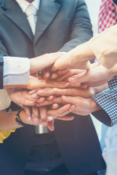 istock Vertical Businessman shaking hands together team partnership teamwork. Trust honesty business customer handshake together promise respect partner. Vertical Horizon Businessman solidarity team Partner 2197334439