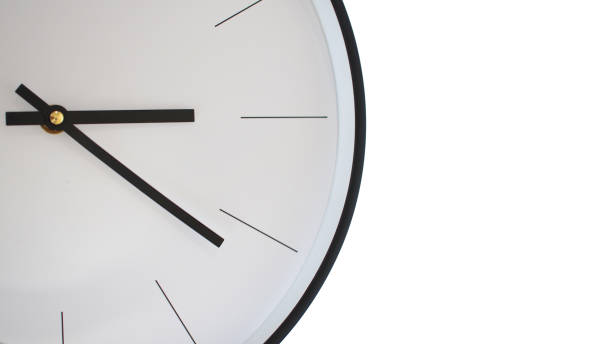 istock A minimalist clock design with clean lines, a white background, and black hands, showcasing simplicity and modern elegance. 2197335352