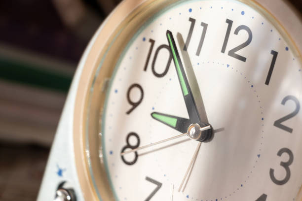 istock An analog clock in the morning sunlight 2197336710