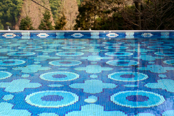 swimming pool decorated with blue tiles in a valley resort