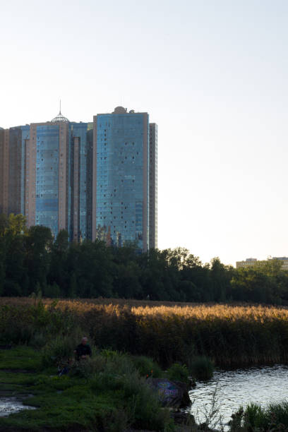 istock Modern apartment buildings on the river bank 2197348234