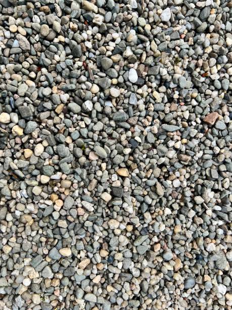 istock Close-up of small gray pebbles, showcasing texture 2197349779