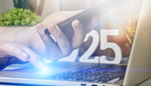 istock Seamless Technology Integration: Hands-On Smartphone and Laptop Interaction with a Vision for 2025 2197350738