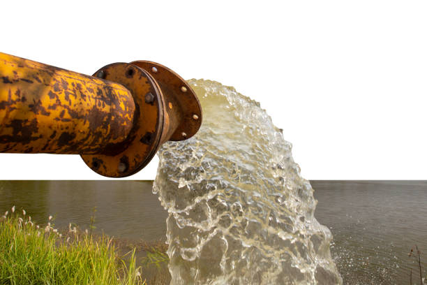 istock Pipe filling water into pond in summer. 2197352049