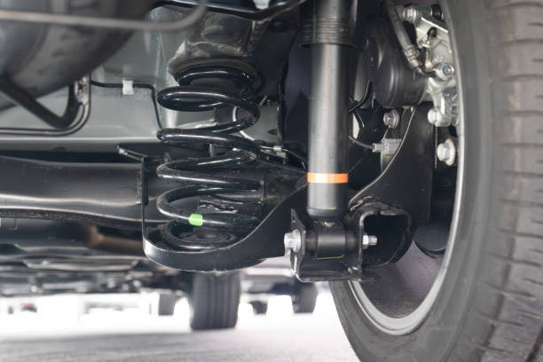 istock MPV car suspension and rear drive shaft. 2197352135
