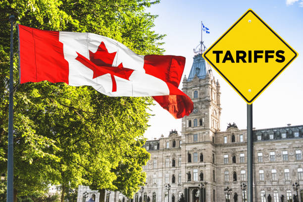 istock Us Tariffs street sign in canada ottawa parliament building 2197352529